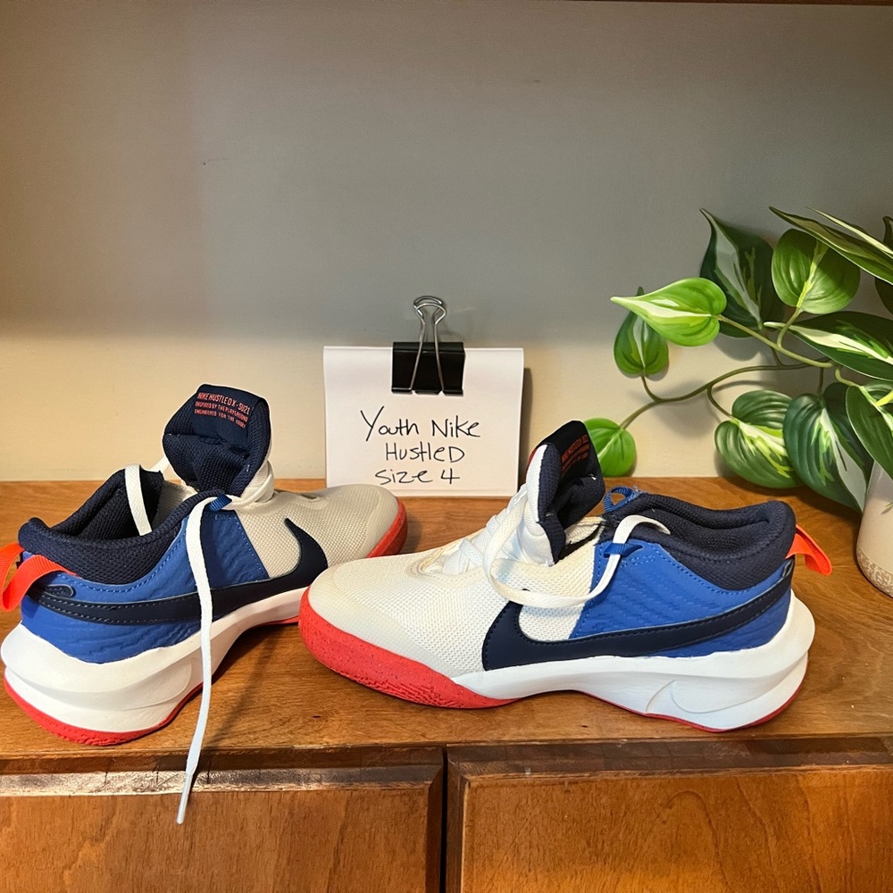 Youth Nike Hustle D10, size 4, never worn, slightly faded